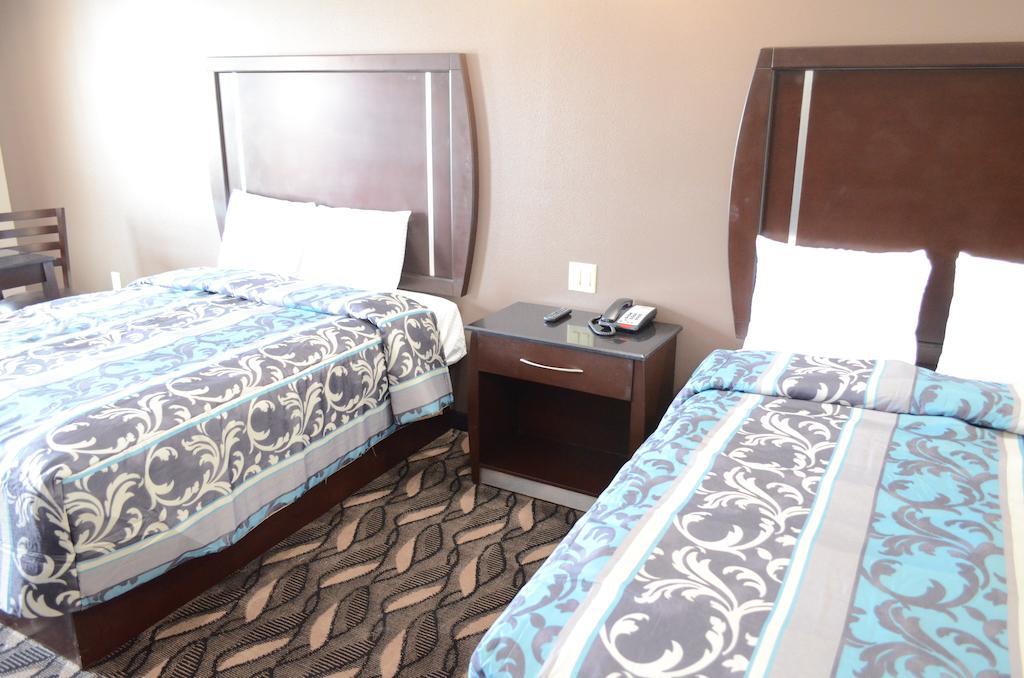 Palace Inn Sam Houston Race Park الغرفة الصورة